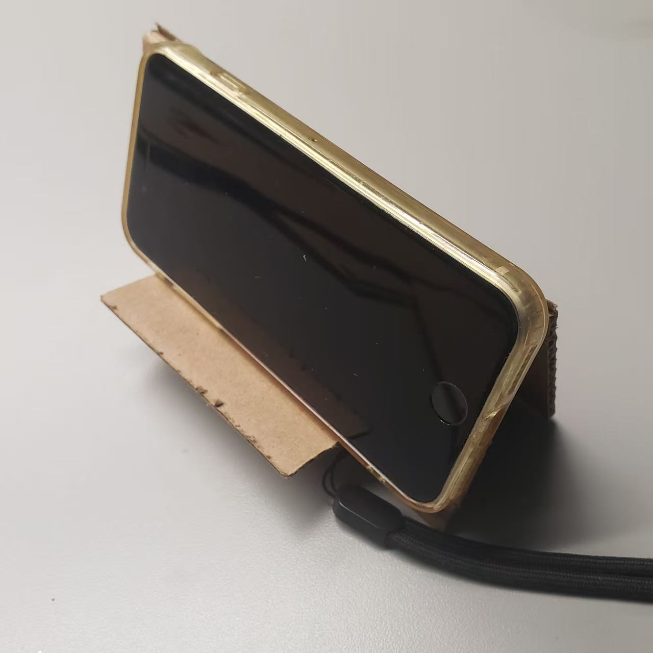 The finished mobile phone stand in operation.